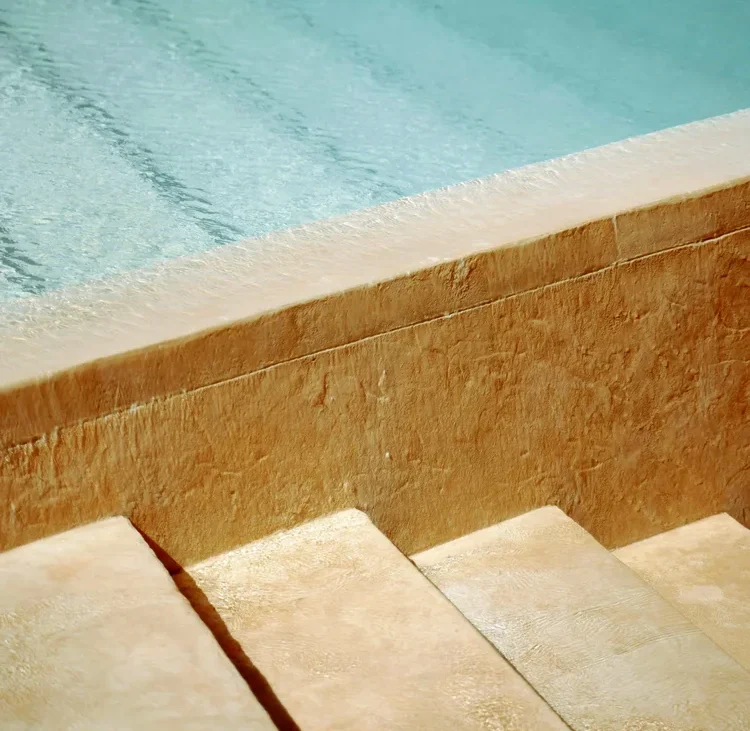 Stone steps at the edge of a clean Paso Robles pool