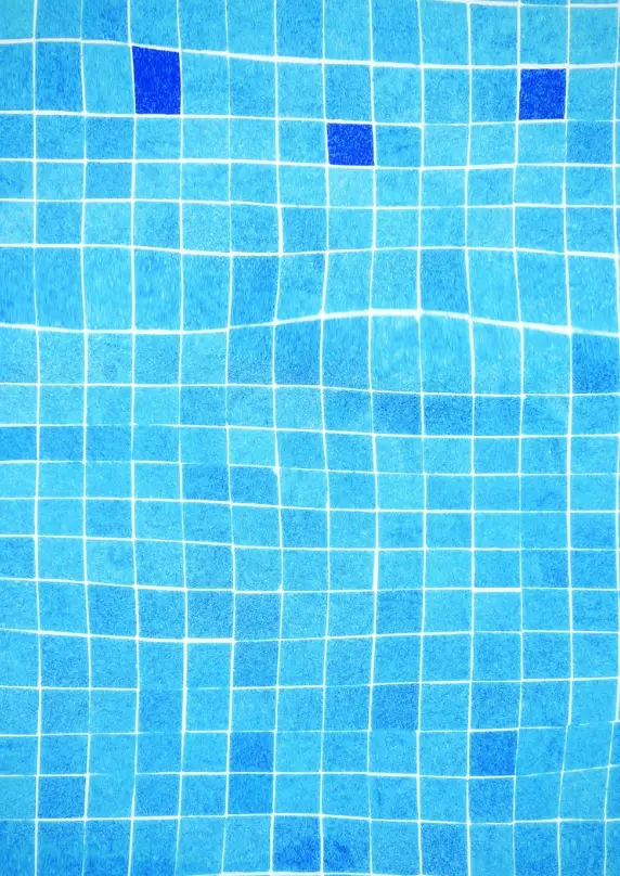 Blue mosaic tile on a pool wall