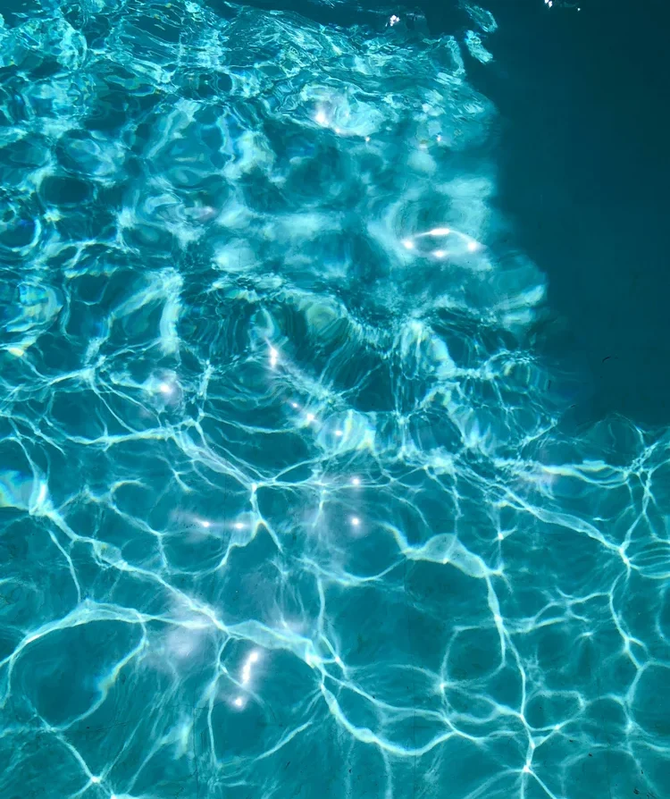 Sun-dappled pool water on a hot Paso Robles day