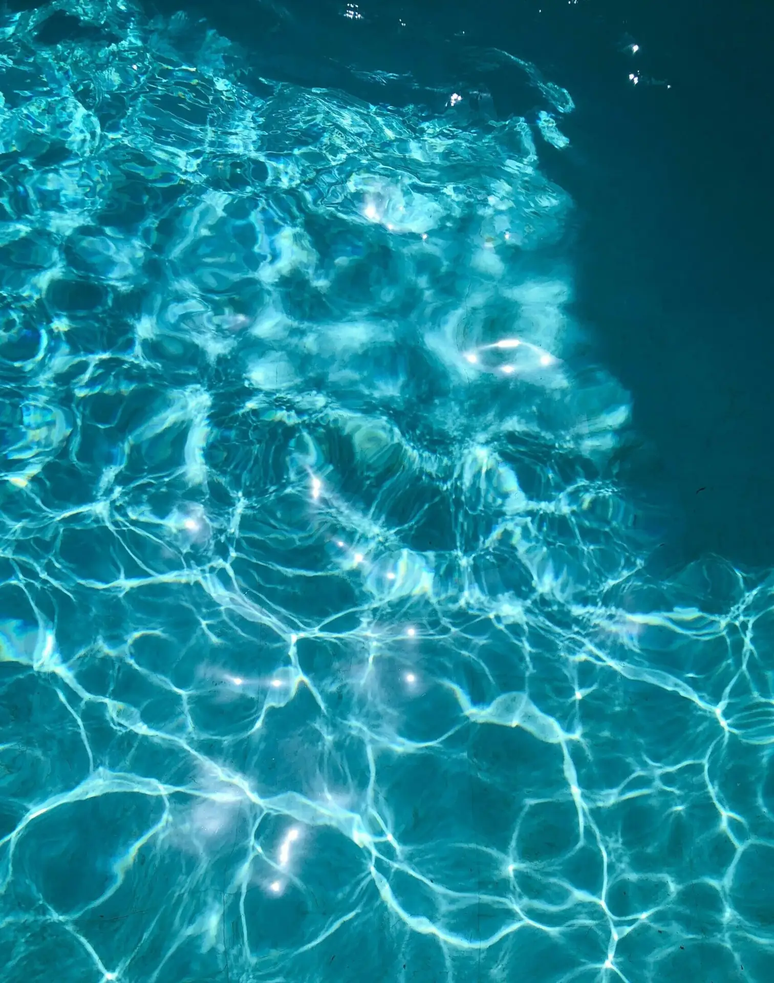 Sparkling clear blue pool water