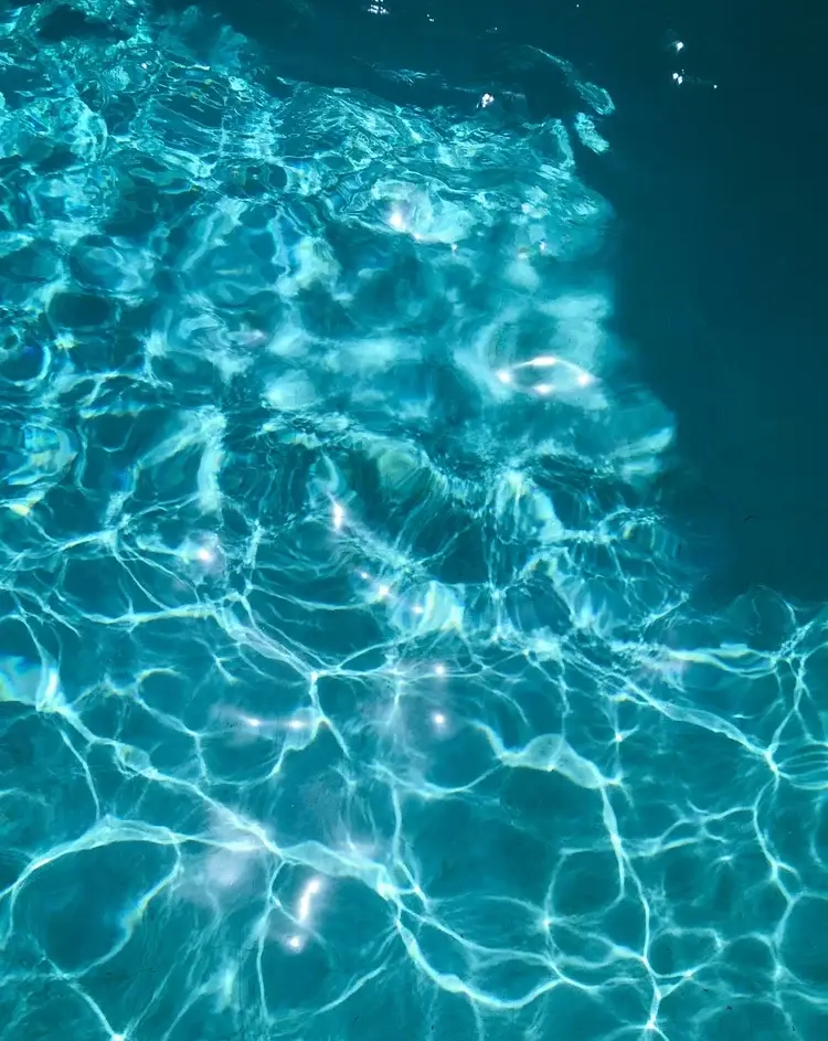 Sunlit ripples across a Central Coast pool