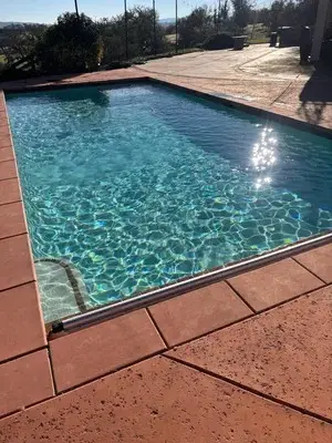 Rectangular pool with terracotta deck